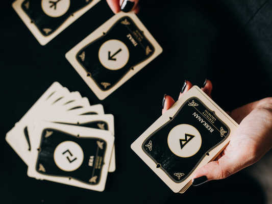 Rune cards on a black table